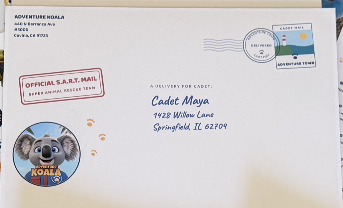 The printed Super Animal Rescue Team envelope addressed to Cadet Maya, stamped Official S.A.R.T. Mail
